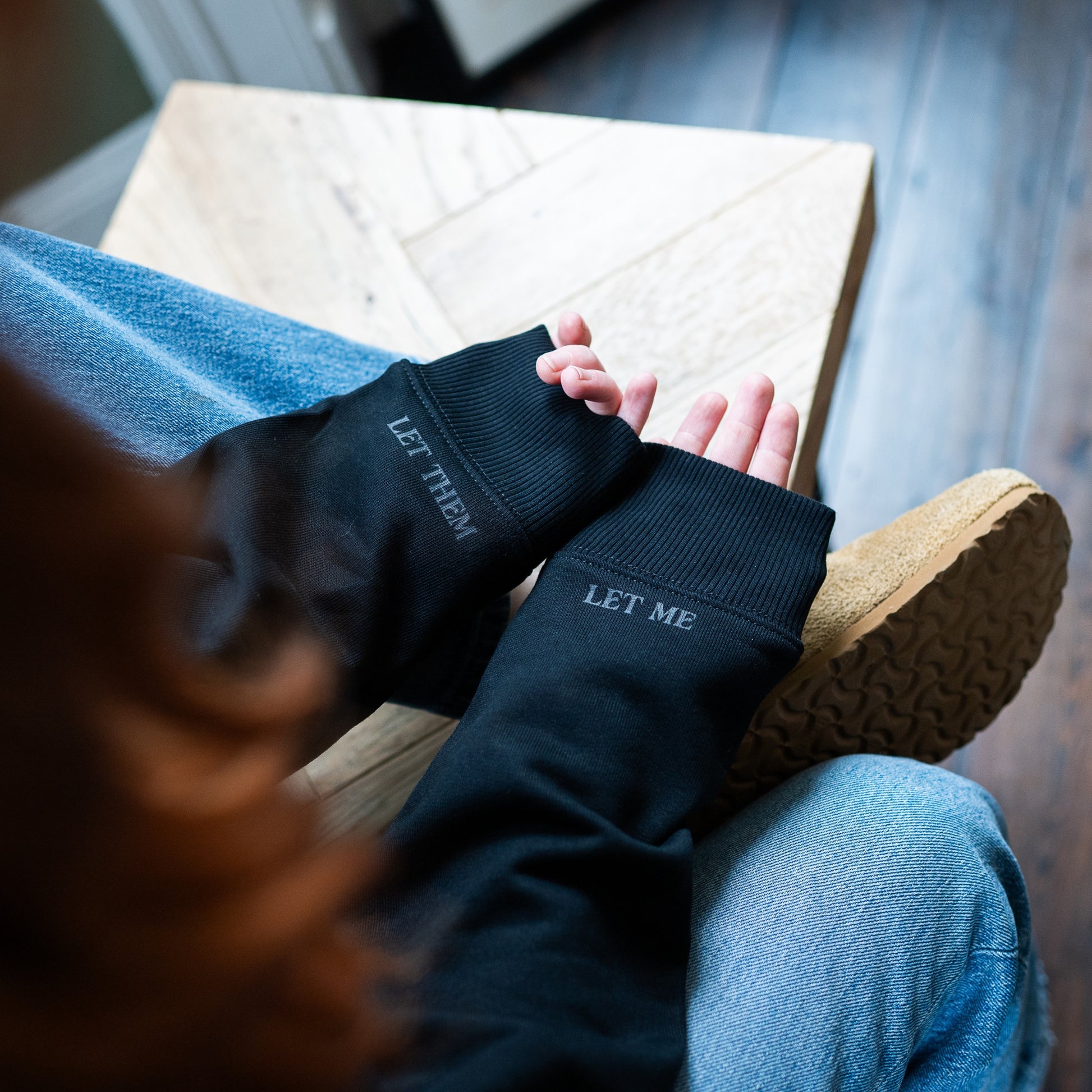 Black sleeves with 'INHALE' and 'EXHALE' text by Every Little Thread