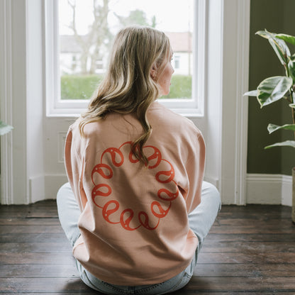 Back of Every Little Thread Sweatshirt in Peach Colour
